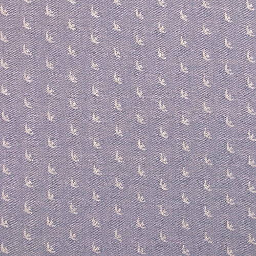 Patterned fabric with small stitched birds on a blue background
