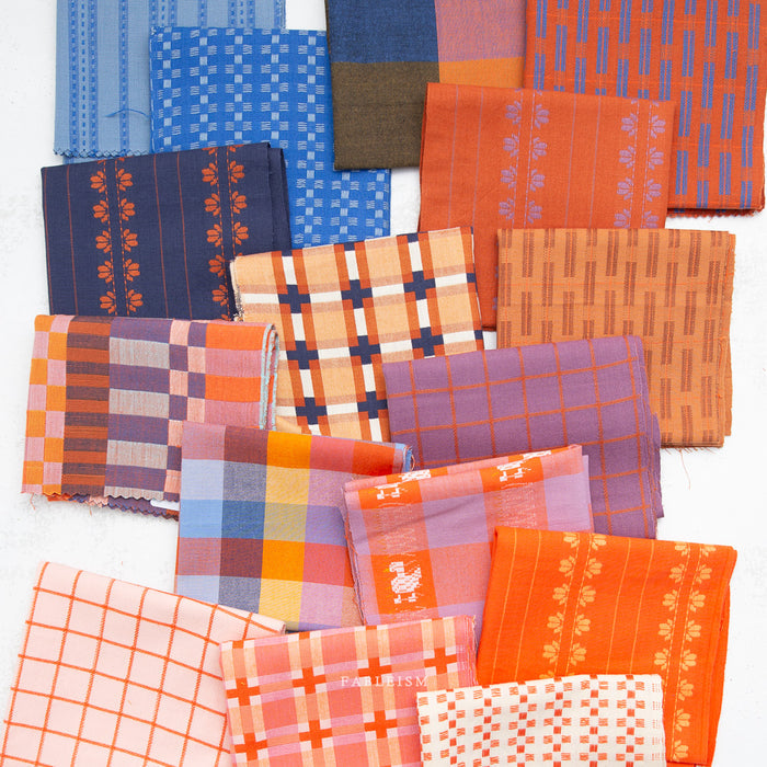 Collection of colorful fabric swatches arranged in a grid pattern.
