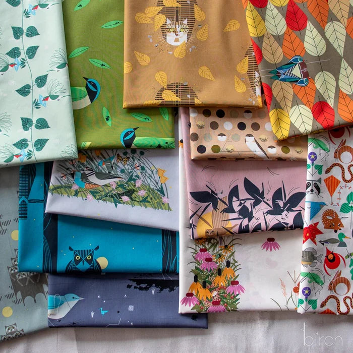 Collection of colorful, modern, nature inspired fabrics with various patterns on a neutral background.