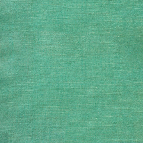 A close-up of a textured fabric or material swatch in a solid minty green color.