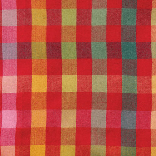 A close-up of a plaid fabric pattern with intersecting vertical and horizontal bands in red, pink, orange, yellow, green, and teal, showing a woven texture.