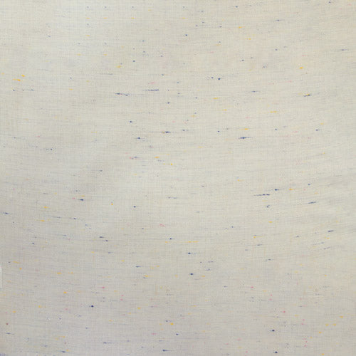 A close-up of a light cream or off-white textured material with subtle multicolored flecks and a fine woven or brushed texture.