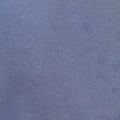 A close-up of a textured blue fabric swatch with a fine woven linen-like pattern.