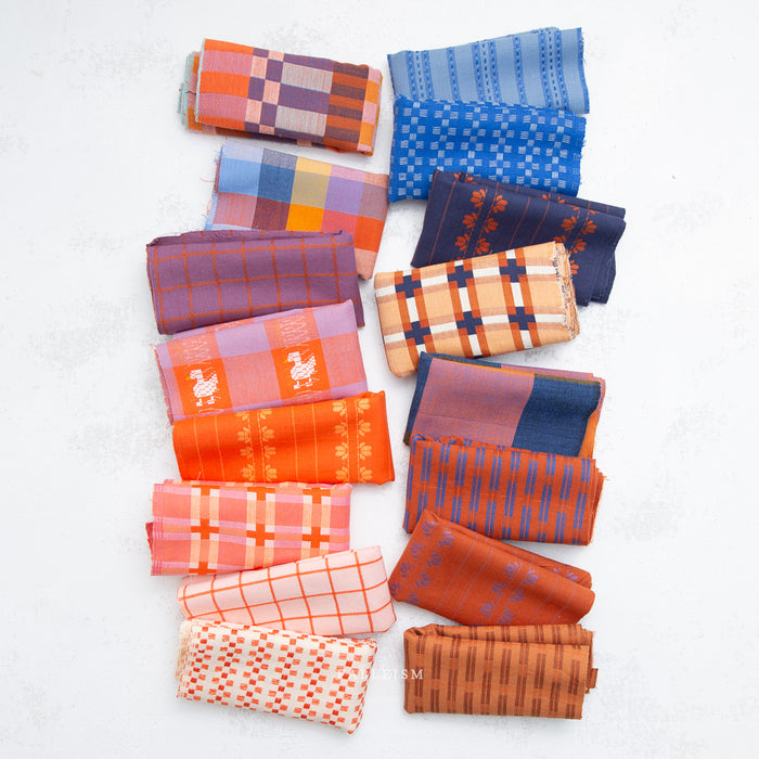 Collection of patterned fabric swatches in various colors on a white background