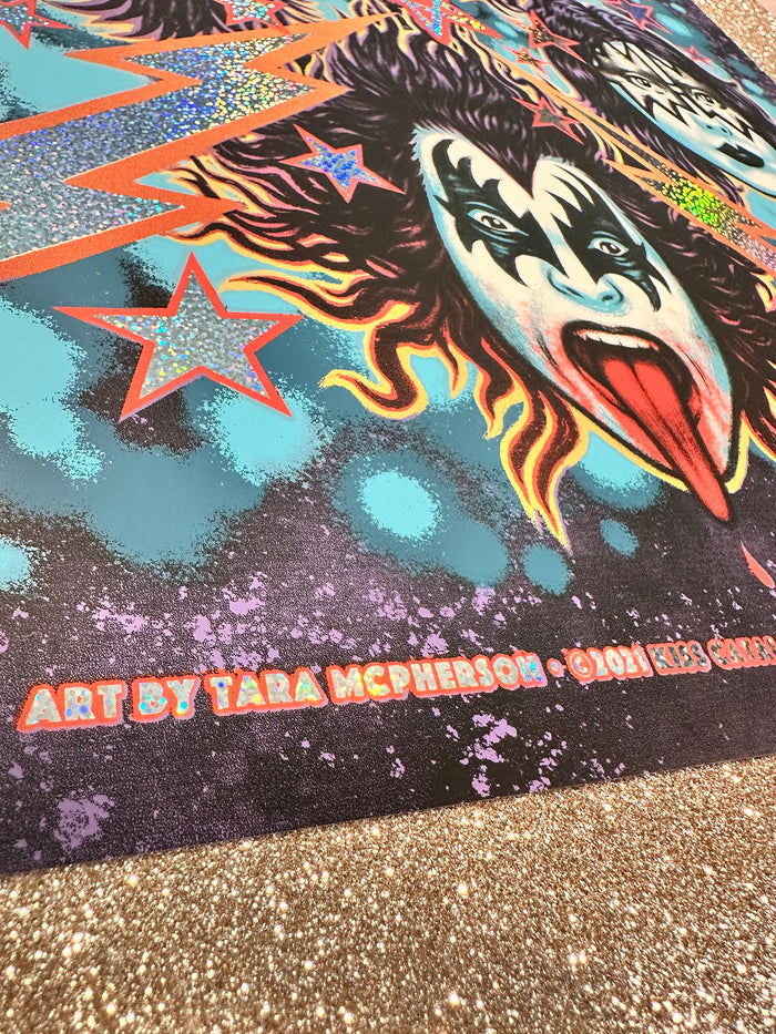 Colorful artwork with a face and star design on a textured surface.