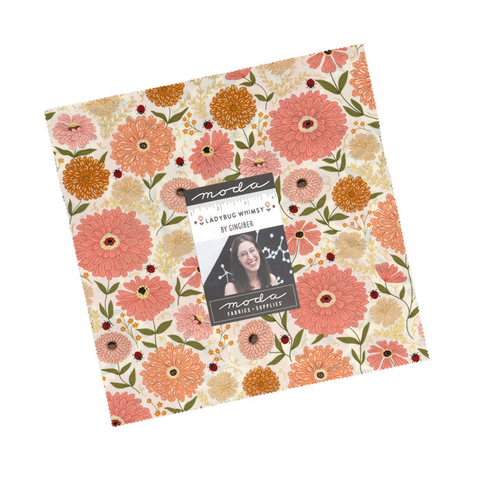 Floral layer cake of fabric with 'Moda' label on a white background