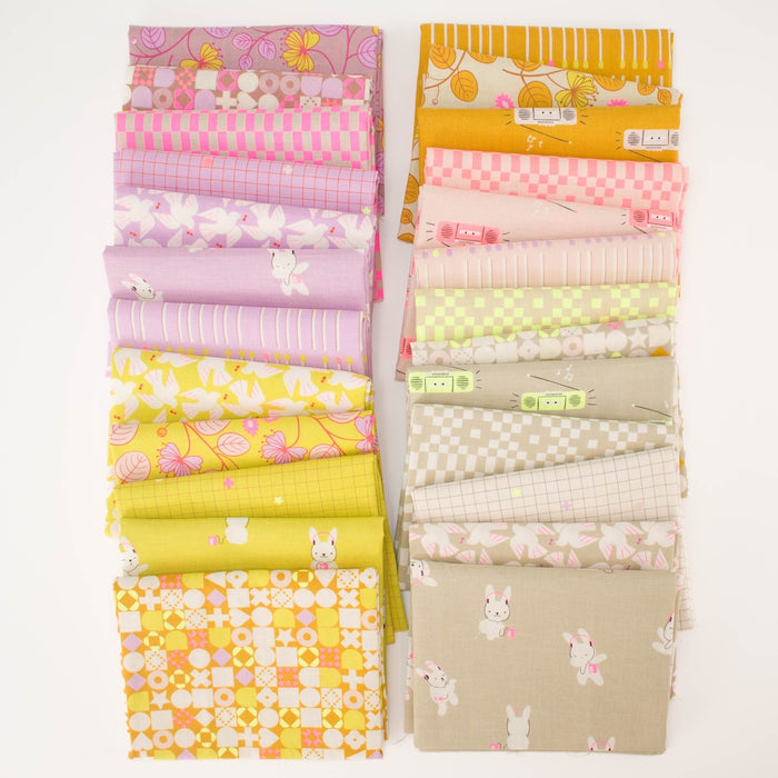 Two stacks of folded fabric samples with a bunny wearing headphones, boom boxes, geometric and floral patterns in pastel purple, neon pink, neon yellow, and beige, arranged side by side on a white background.