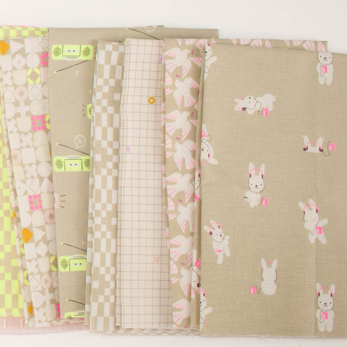 A fanned out line of seven patterned fabric swatches in beige colors, with neon pink & neon yellow accents, featuring various geometric, bird, and bunny motifs on a white background.