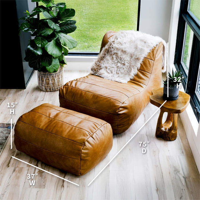 Brown leather armchair with ottoman in a room with a plant and window. #color_copper-harbor-premium-vegan-leather