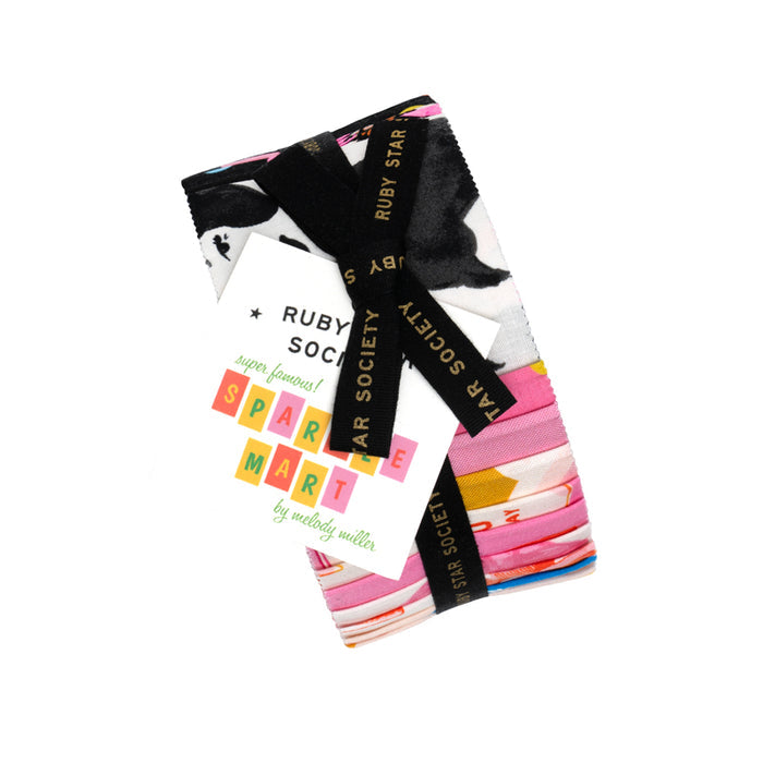 Photo of a strip roll of fabrics, showing black, white, pinks, and yellows, with a label reading Sparkle Mart on a white background.