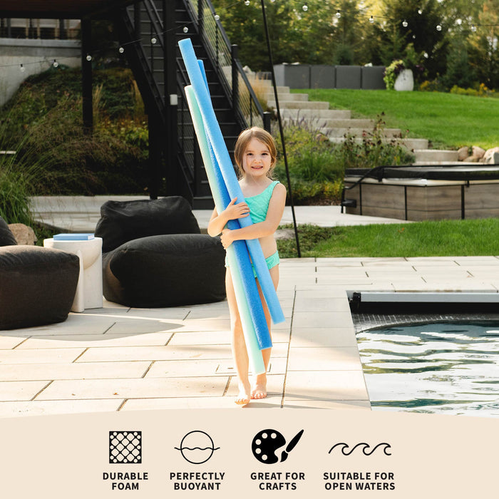 A young girl in a swimsuit stands by a poolside patio holding three long blue foam pool noodles. The image includes feature icons and text at the bottom stating 'DURABLE FOAM', 'PERFECTLY BUOYANT', 'GREAT FOR CRAFTS', and 'SUITABLE FOR OPEN WATERS'. #color_blues