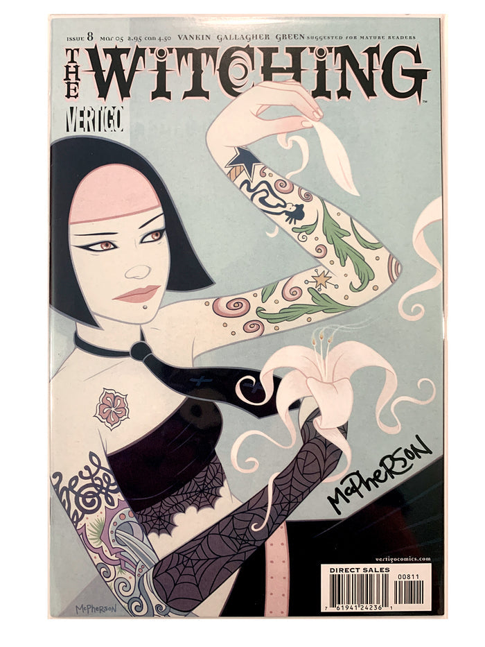 The Witching #8 comic book featuring stylized cover art by Matheson, with a woman's tattooed arms, black hair, pale skin, and a muted blue-gray background. Signed by Tara McPherson
